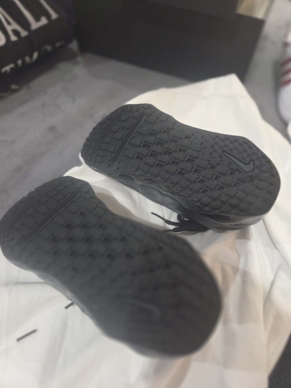 Nike All-Black Athletic Sneakers - Black Soles